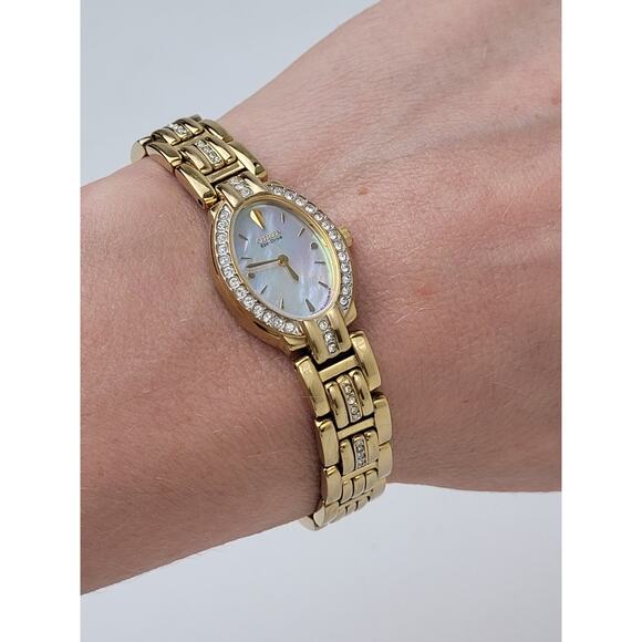 Citizen Eco-Drive Women's Watch Mother of Pearl Face and Gold Tone Band EUC - Picture 1 of 7